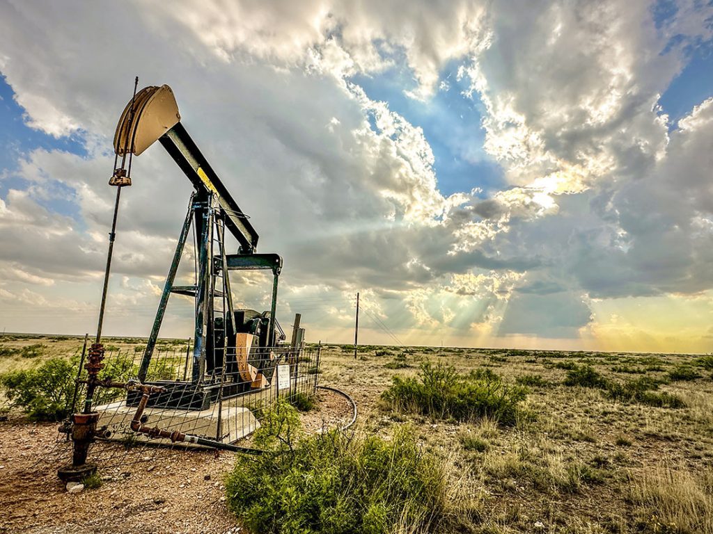 an abandoned oil well sitting on land slowly leaking methane and other dangerous gases.